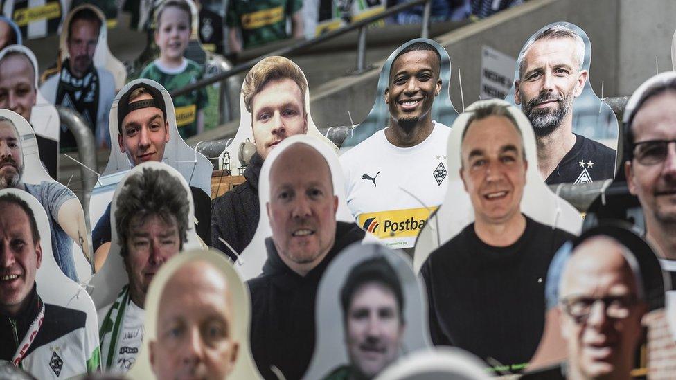 Pictures of fans, players, coaches and staff of Bundesliga club Borussia Moenchengladbach are seen at Borussia-Park