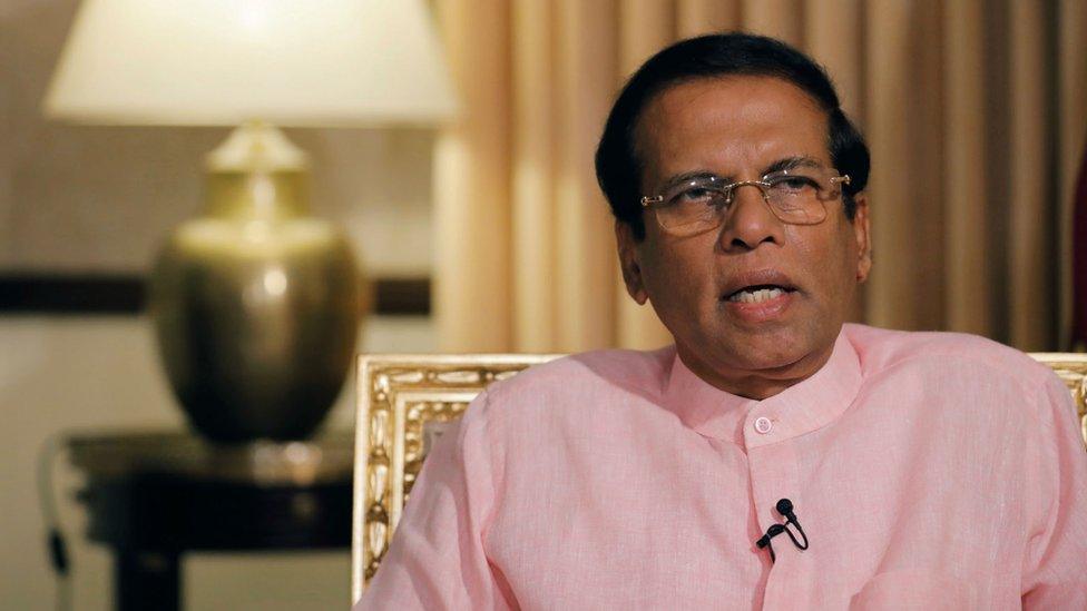 Sri Lanka's President Maithripala Sirisena speaks during an interview with Reuters at his residence in Colombo