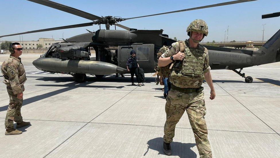 Brigadier Richard Bell gets off a helicopter in Iraq