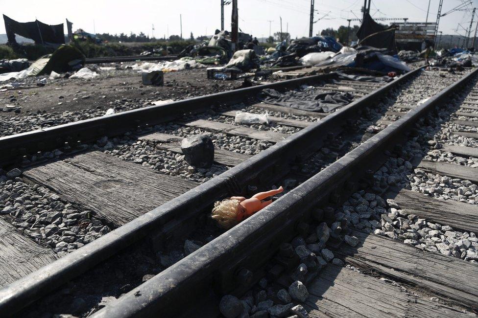An abandoned doll at the empty site of the Idomeni migrant camp in northern Greece, 26 May