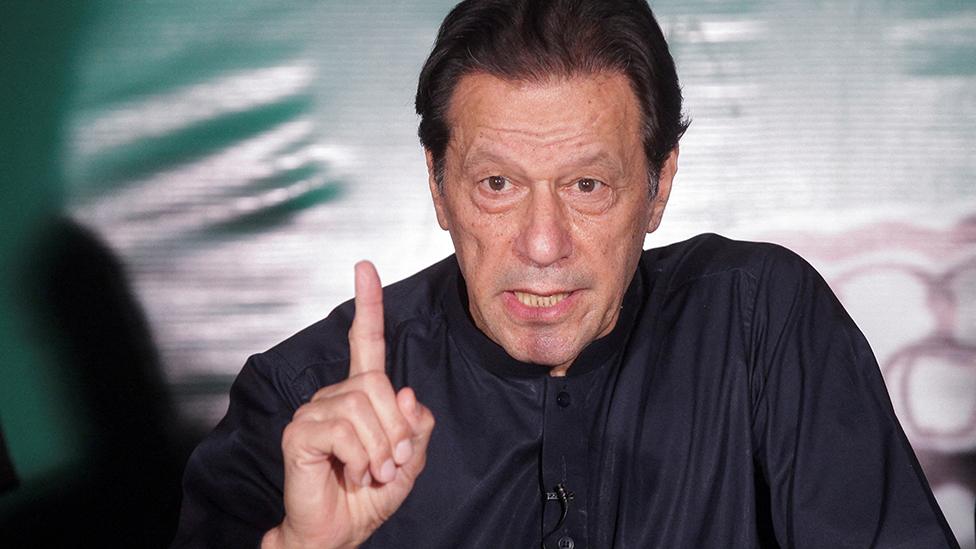 Pakistan's former Prime Minister Imran Khan speaks to the media at his residence in Lahore, Pakistan May 18, 2023. REUTERS/Mohsin Raza