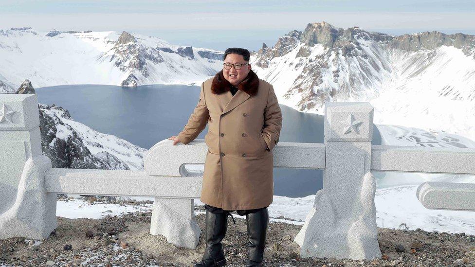 An undated picture released by North Korea's official Korean Central News Agency (KCNA) on 4 December, 2019 shows North Korean leader Kim Jong-un posing as he visits battle sites at Mount Paektu, Ryanggang