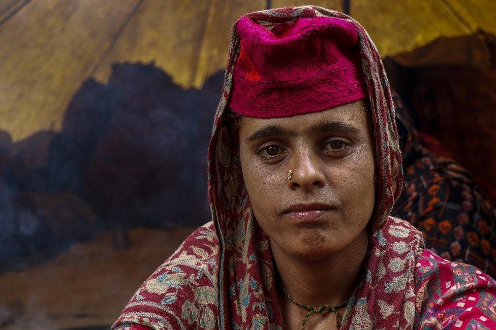 Zulfi seen outside her tent