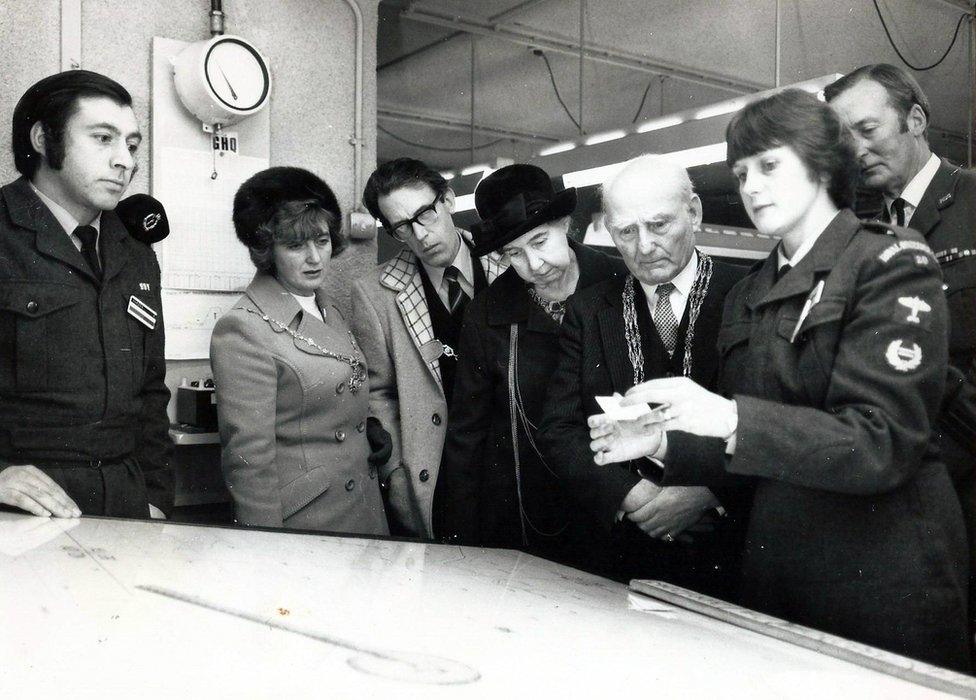 Ann Metcalfe in the 1960s demonstrating her role to visiting dignitaries at York Cold War bunker