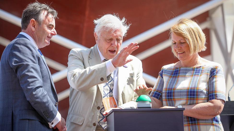 Sir David Attenborough presses button