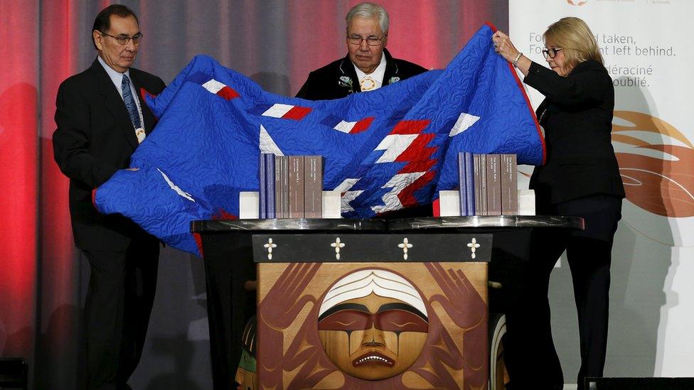 (L-R) Commissioner Chief Wilton Littlechild, Justice Murray Sinclair and Commissioner Marie Wilson unveil the Truth and Reconciliation Commission's final report in Ottawa, Canada, December 15, 2015.