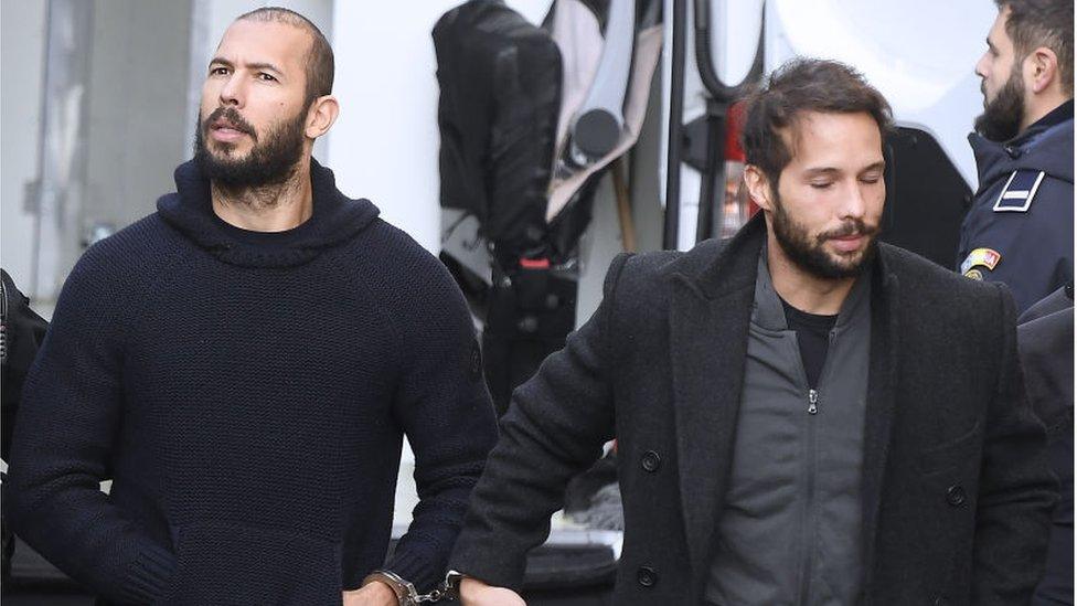 Andrew Tate (left) and his brother Tristan (right) leaving court in Bucharest