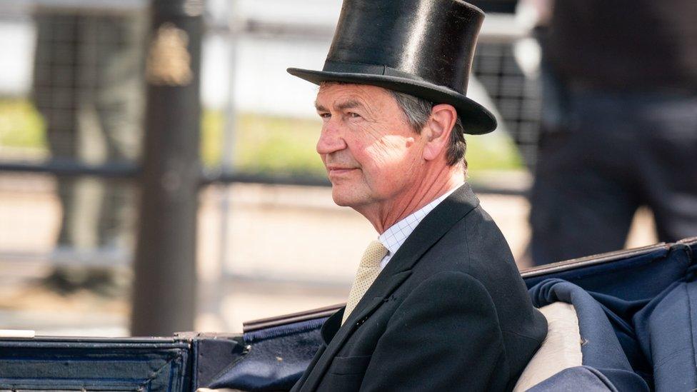 Vice Admiral Sir Tim Laurence rides in a carriage as the Royal Procession leaves Buckingham Palace for the Trooping the Colour ceremony at Horse Guards Parade