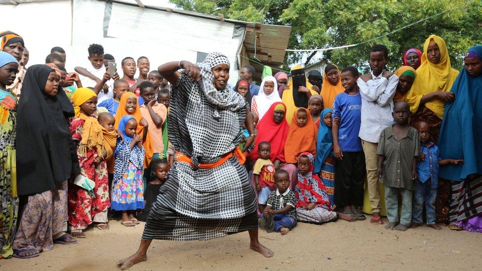 A woman dancing at a wedding in Mogadishu, Somalia in August 2016