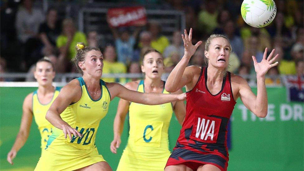 Chelsea Pitman of England (R) catches the ball during the Netball Gold Medal Match on day 11 of the Gold Coast 2018 Commonwealth Games at Coomera Indoor Sports Centre on April 15, 2018 on the Gold Coast, Australia.