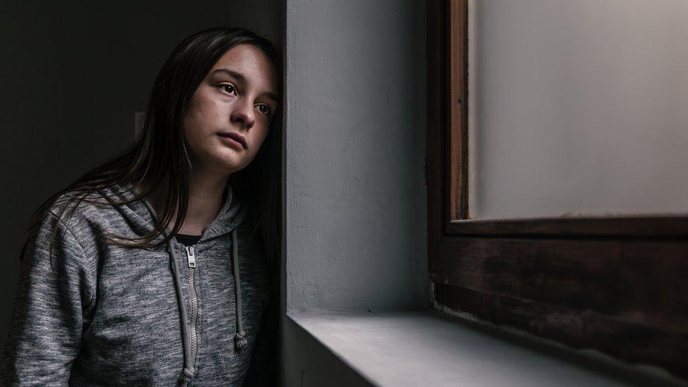 A stock picture of a teenager with mental health issues