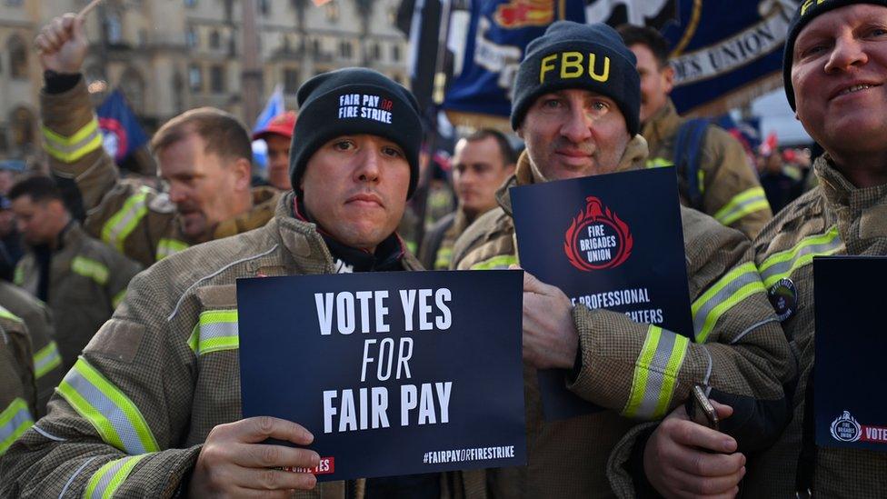 Firefighters protest outside parliament in London