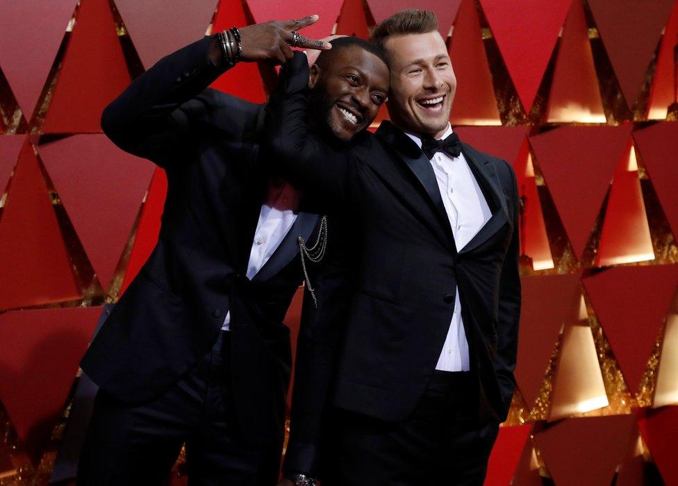 Aldis Hodge (left) and Glen Powell