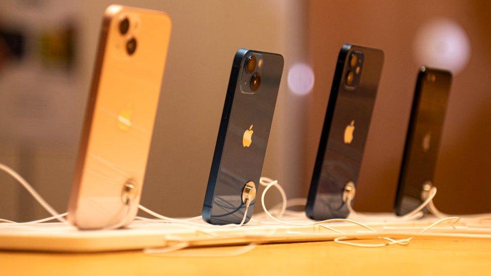 Apple iPhones displayed at the Apple store in New Delhi, India.