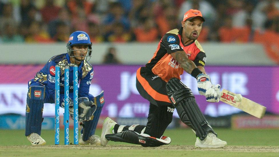 Shikhar Dhawan (right) plays a shot for IPL team Sunrisers Hyderabad