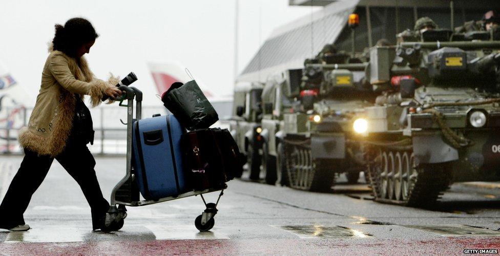 Armoured personnel carrier's patrol Terminal 4 at Heathrow, 11 February 2003