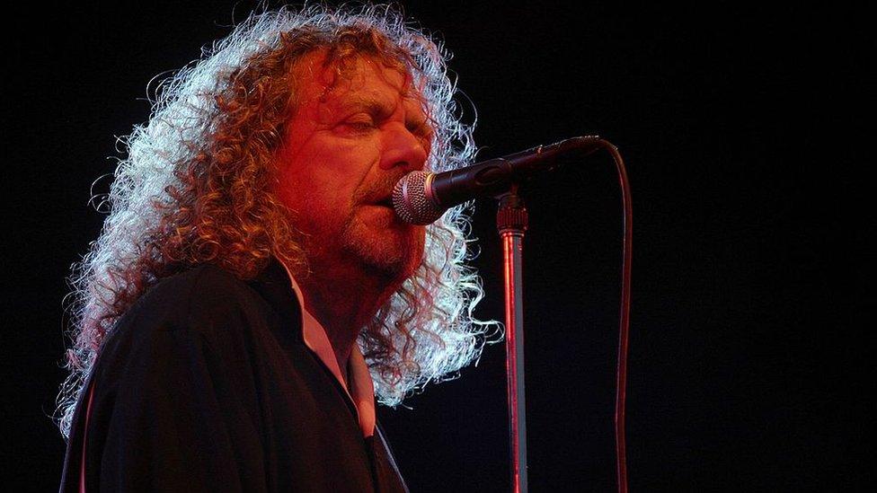 Robert Plant performs onstage at Cornbury in 2006