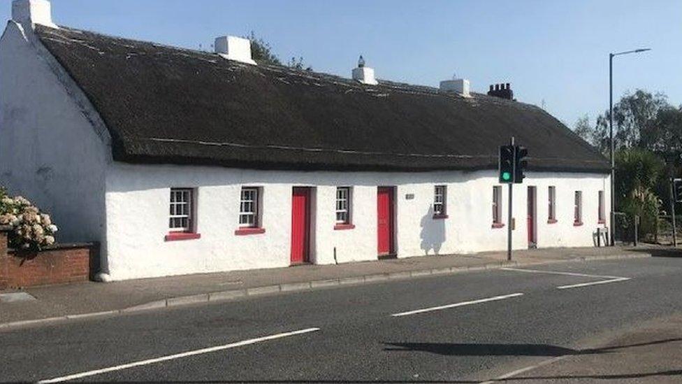 The McArdle family live in a thatched cottage