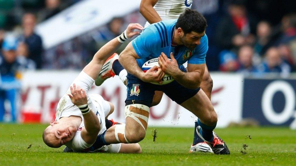 Andrea Masi is tackled by England full-back Mike Brown in Italy's Six Nations Championship opener in 2015