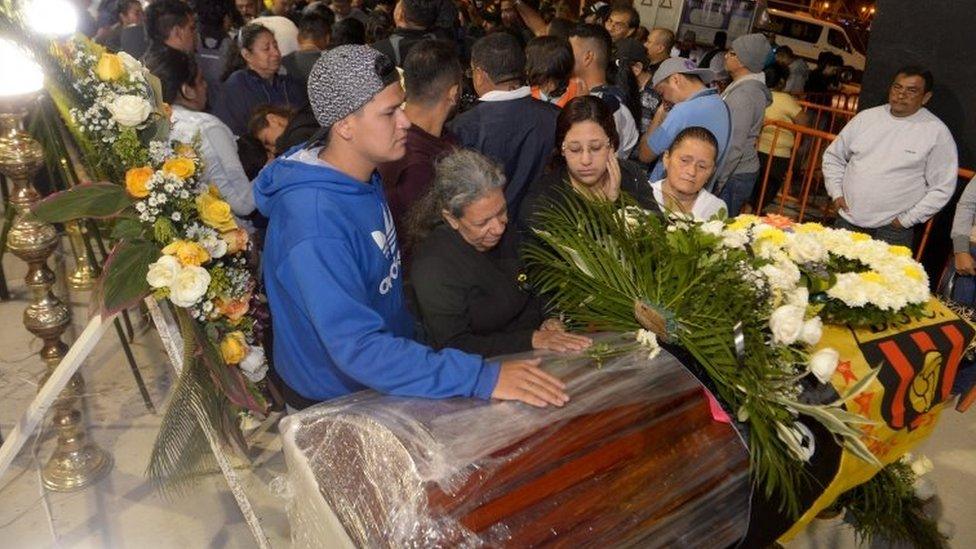 Relatives and fans of Barcelona SC football club mourned the fans killed in Sunday's bus crash