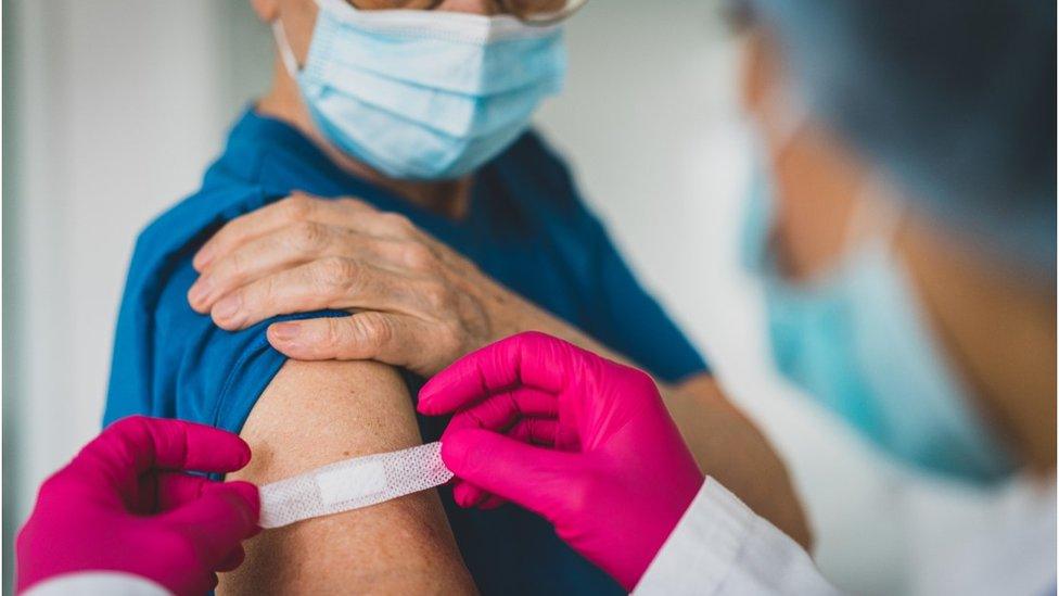 Woman who has just had injection