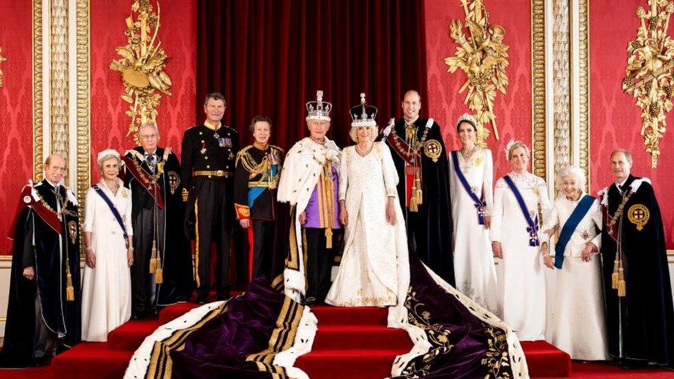 King Charles and Queen Camilla in formal dress with other senior royals