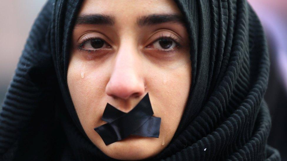 A Turkish student cries during a protest to show solidarity with trapped citizens of Aleppo, Syria, in Sarajevo, Bosnia