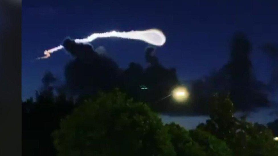 A strange cloud trail in the early morning sky above Florida left observers on the ground in awe.