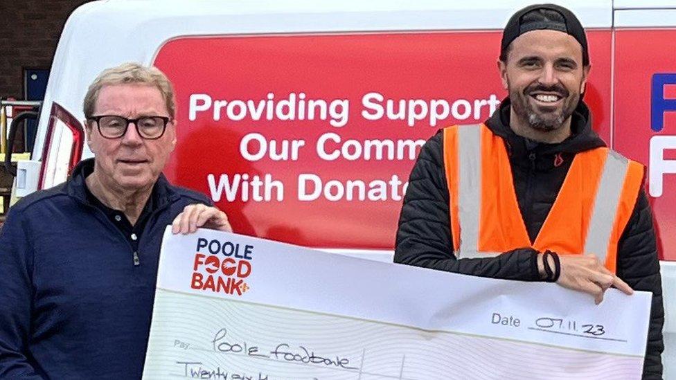 Harry Redknapp and Joshua Mitchell holding a giant cheque