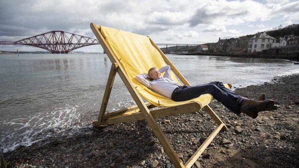 Willie Rennie in a giant deck chair