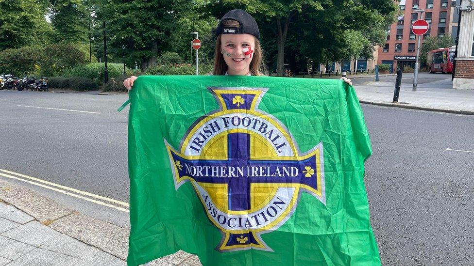 Megan, 9, with a Northern Ireland flag