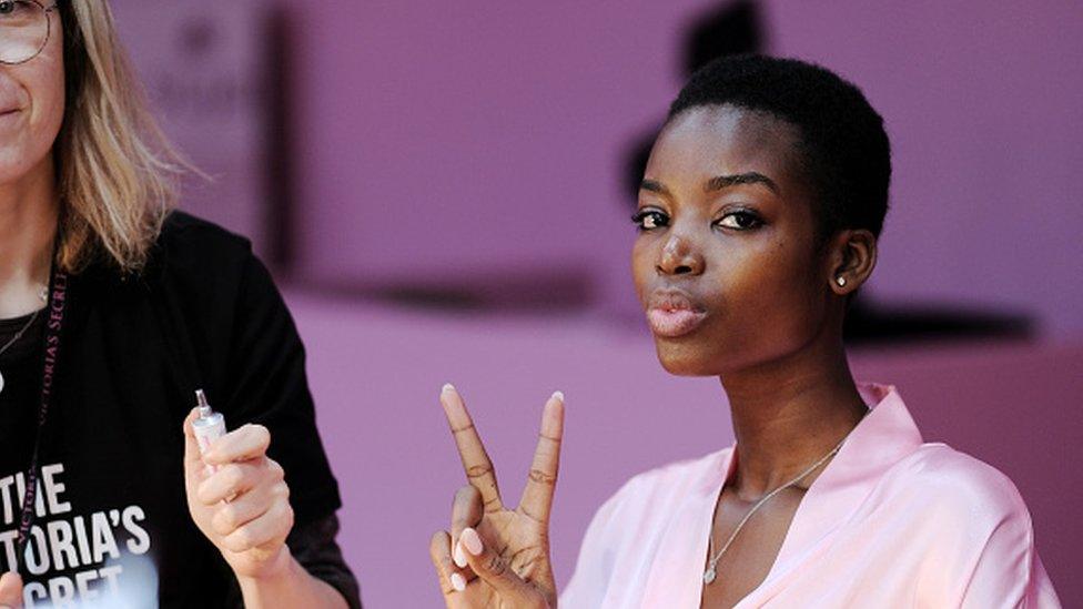 Maria Borges has her hair and makeup done prior the 2016 Victoria's Secret Fashion Show in Paris (30 November 2016)