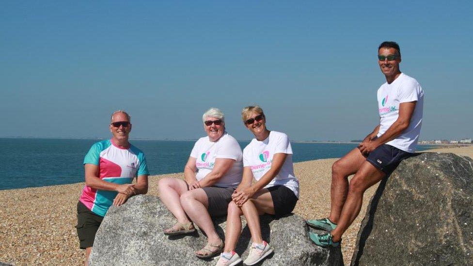 The swimmers on a beach