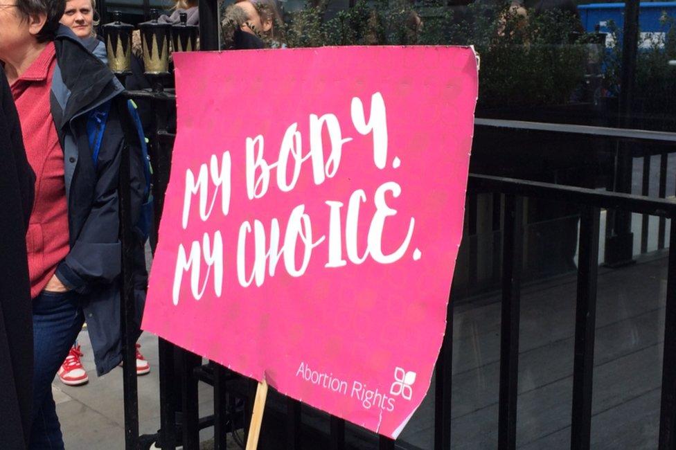 Placard reading: "My body, my choice."