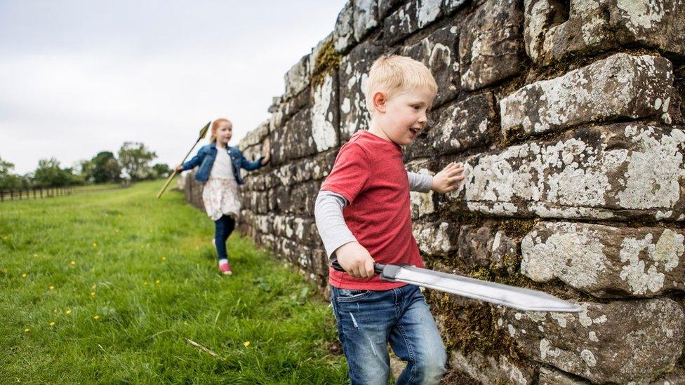 Children next to Hadrian's Wall