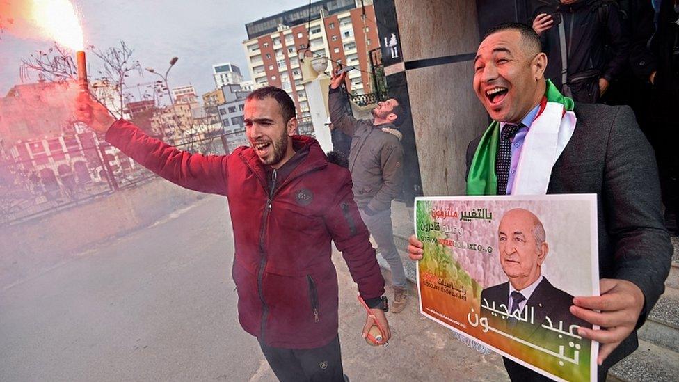 Supporters of Abdelmadjid Tebboune celebrate his victory in Algiers on December 13, 2019