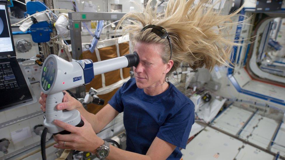 Astronaut Karen Nyberg taking an eye exam