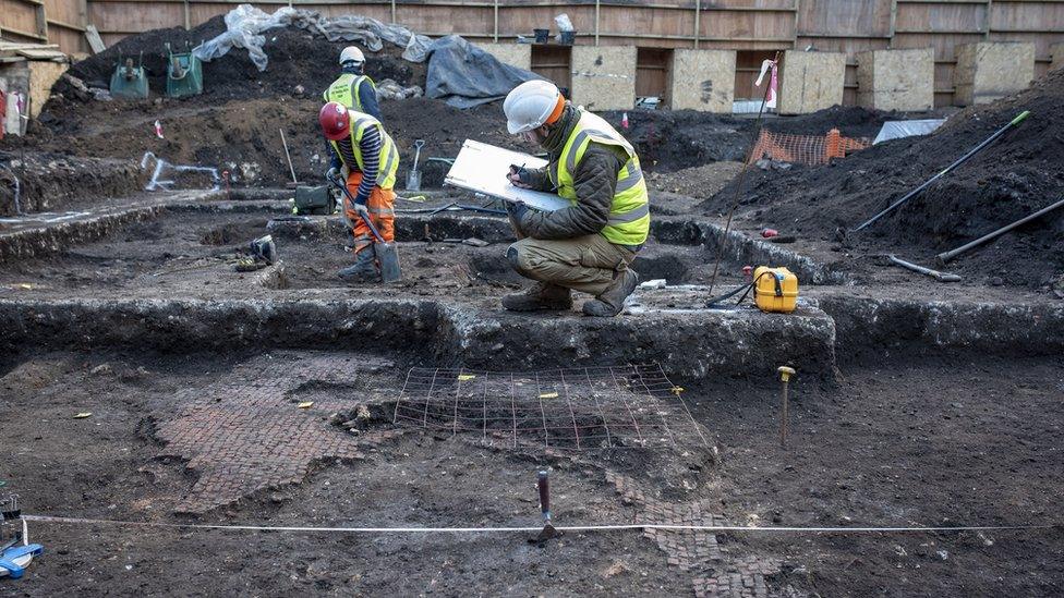 Archaeologists on site