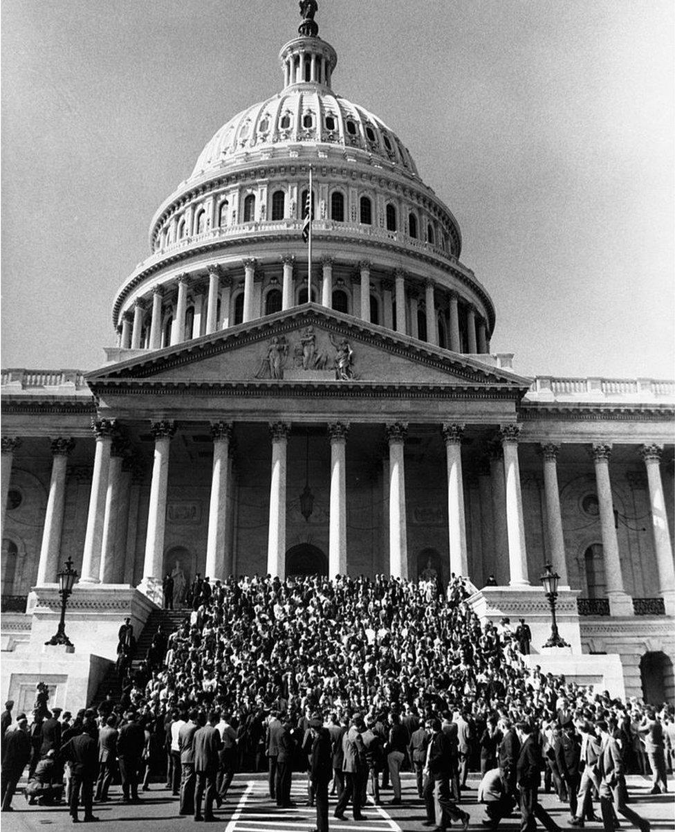 Anti-war demonstrators fill the steps of the United States Capitol Building