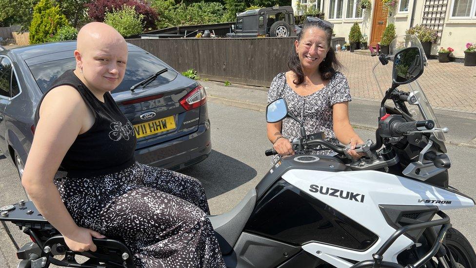 Lia on a bike with her mum Linsey