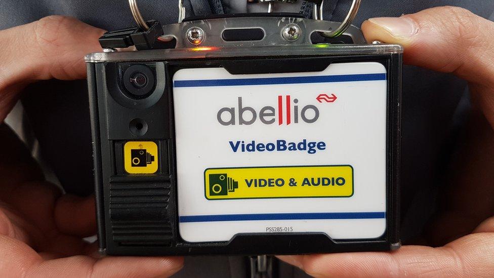 Camera badge for railway carriage and platform staff