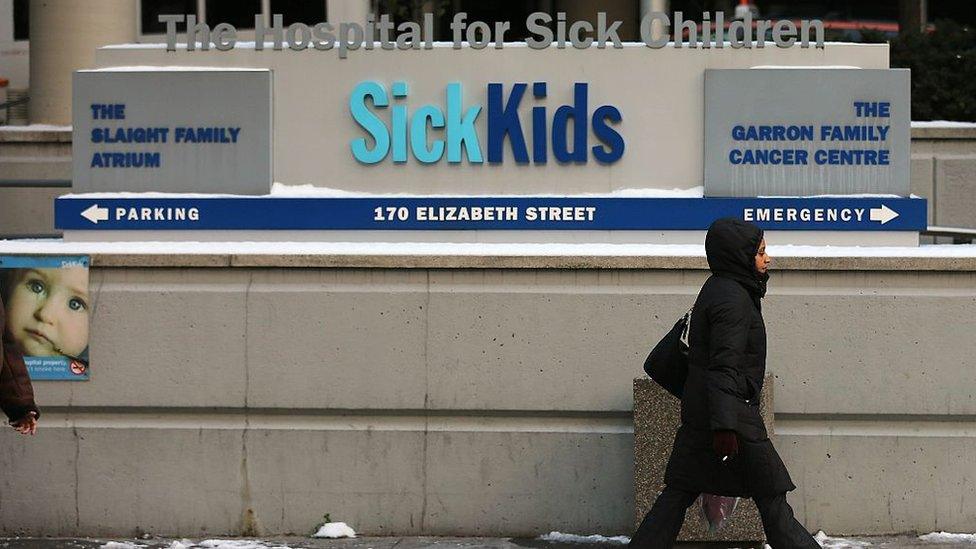 A person walks by SickKids hospital