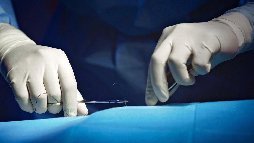 Surgeon's hands during operation