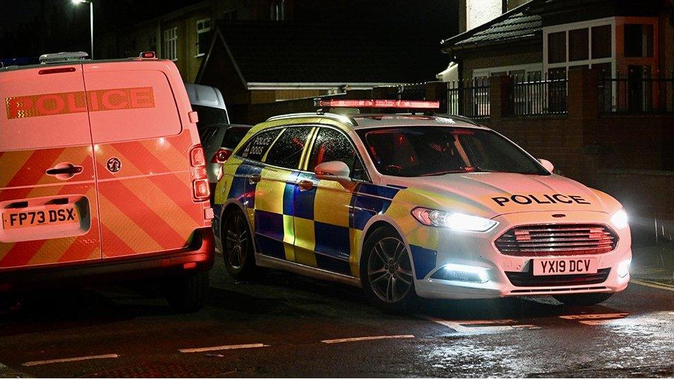 Police cars at scene