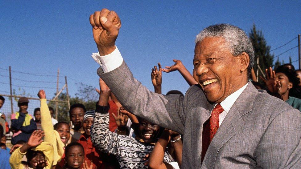 Nelson Mandela visits Hlengiwe School to encourage students to learn