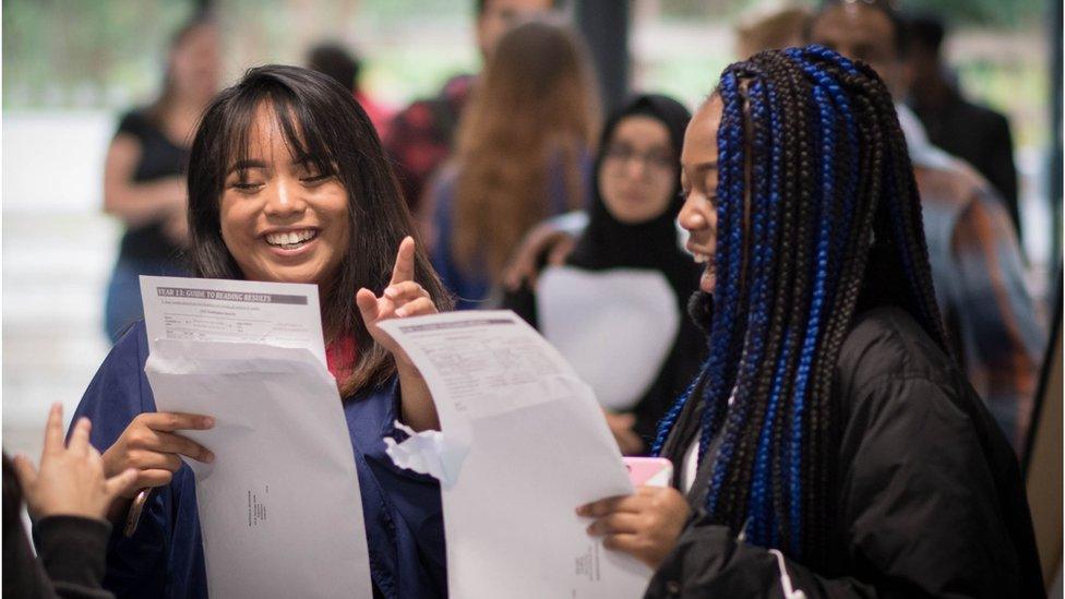 students getting exam results