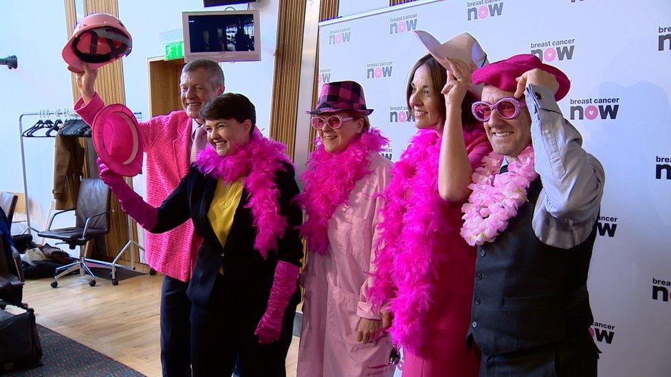 Party leaders don pink outfits for a cancer awareness drive at Holyrood