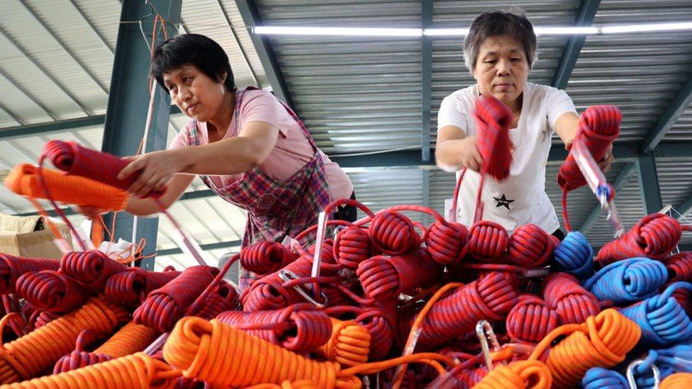 Workers speed up production of sports rope net orders at a workshop of a sports rope net production enterprise in Lizhuang town, Huimin county, Binzhou City, Shandong Province, China, Aug 15, 2022.