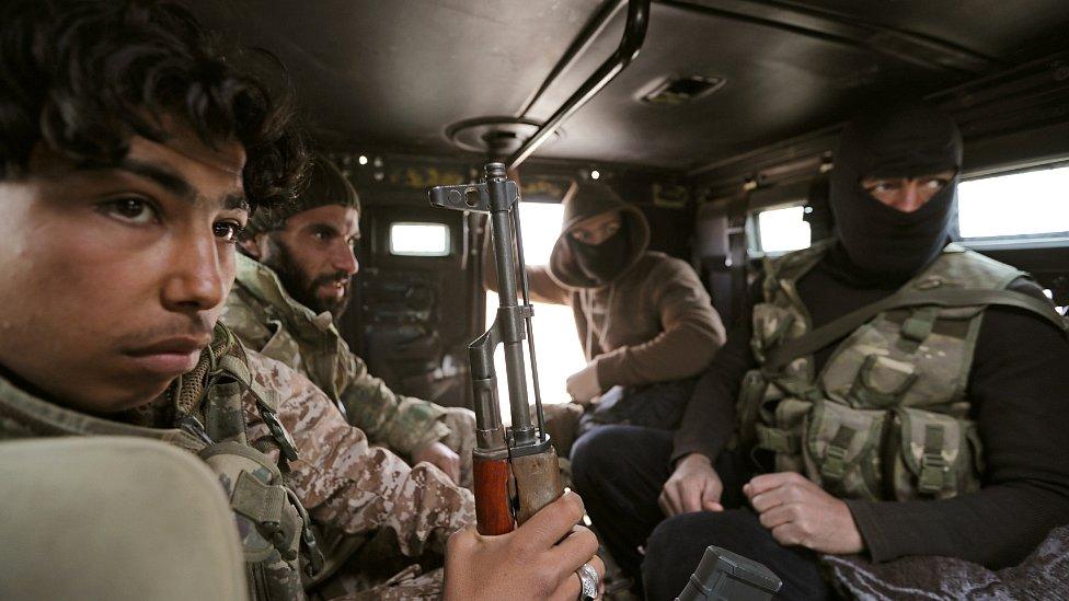 Turkey-backed Free Syrian Army fighters are seen in their vehicle in al Ajami village in east al Bab, Syria February 3,2018