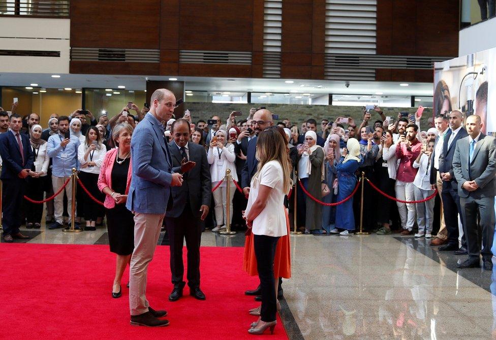 Prince William is welcomed upon his arrival at Luminus Technical University College in Amman